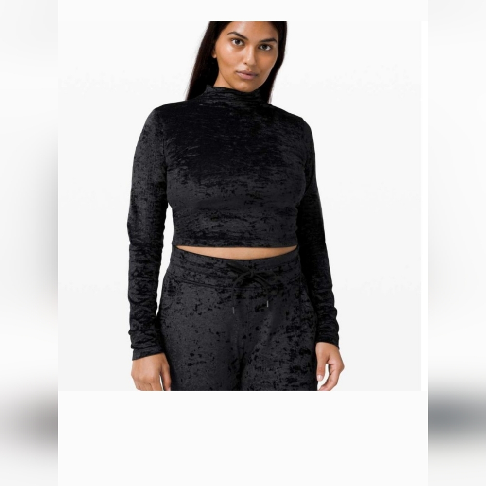 All aligned black velor top.